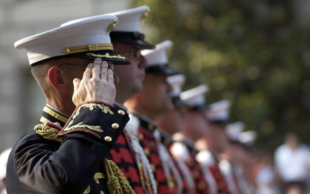 men in uniform saluting